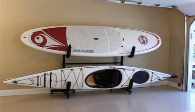 1 SUP and 1 small Kayak mounted on the Z Racks attached to the free-standing frame.