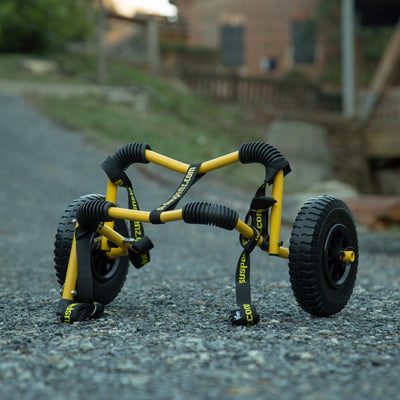 small kayak carrier cart on pavement