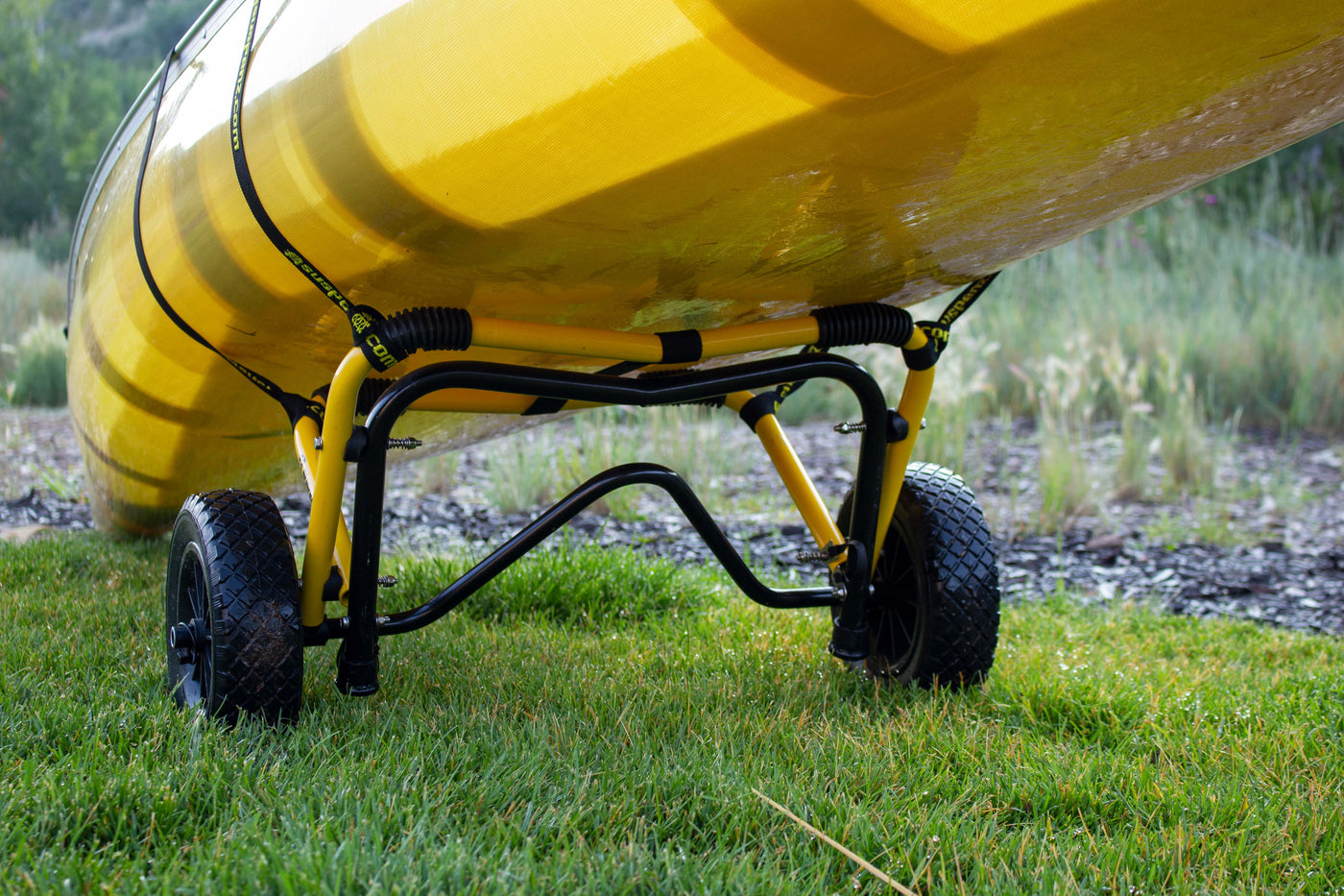 Yellow Canoe on a flat platform heavy duty cart