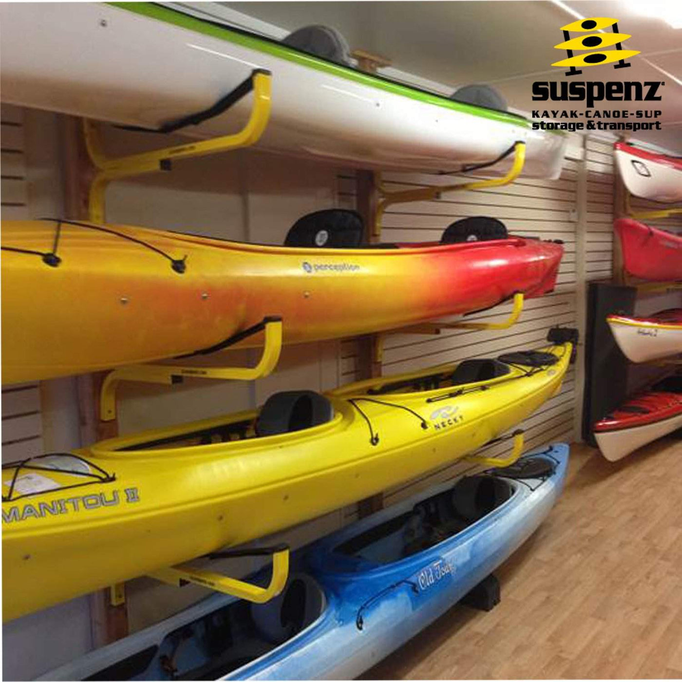 8 kayaks stored on FLAT Racks in a store.